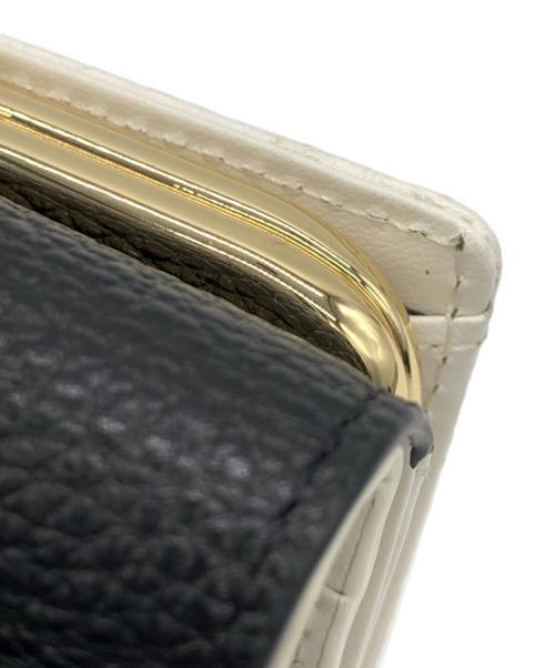 Samantha Thavasa（サマンサタバサ）Samantha Thavasa (サマンサタバサ) エムシュシュⅢ 口金折財布 ブラック×ホワイトの古着・服飾アイテム