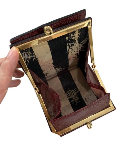 Vivienne Westwood（ヴィヴィアンウエストウッド）Vivienne Westwood (ヴィヴィアンウエストウッド) 2つ折り財布 ワインレッドの古着・服飾アイテム