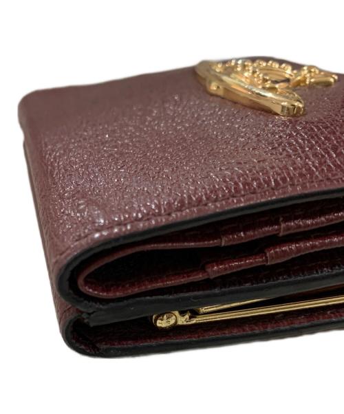 Vivienne Westwood（ヴィヴィアンウエストウッド）Vivienne Westwood (ヴィヴィアンウエストウッド) 2つ折り財布 ワインレッドの古着・服飾アイテム