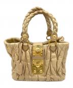 MIU MIUミュウミュウ）の古着「マテラッセ」｜ベージュ