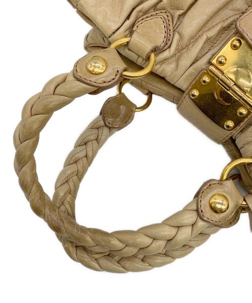 MIU MIU（ミュウミュウ）MIU MIU (ミュウミュウ) マテラッセ ベージュの古着・服飾アイテム