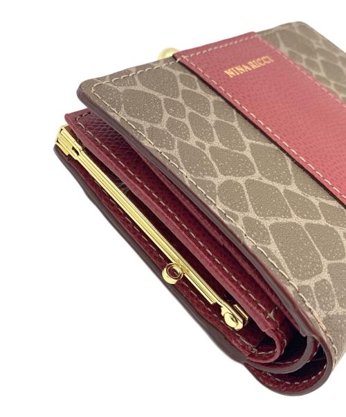 NINA RICCI（ニナリッチ）NINA RICCI (ニナリッチ) 2つ折り財布 ブラウン×レッドの古着・服飾アイテム