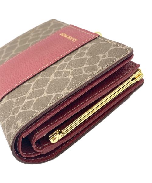 NINA RICCI（ニナリッチ）NINA RICCI (ニナリッチ) 2つ折り財布 ブラウン×レッドの古着・服飾アイテム