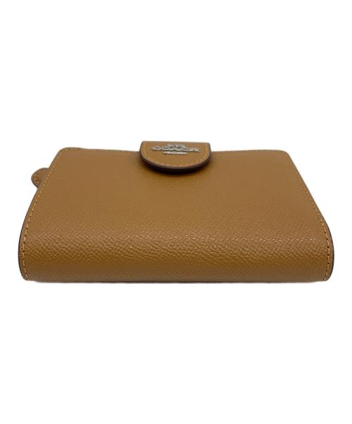 COACH（コーチ）COACH (コーチ) 2つ折り財布 ブラウンの古着・服飾アイテム