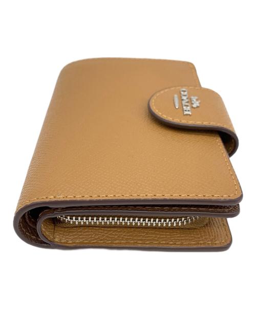 COACH（コーチ）COACH (コーチ) 2つ折り財布 ブラウンの古着・服飾アイテム