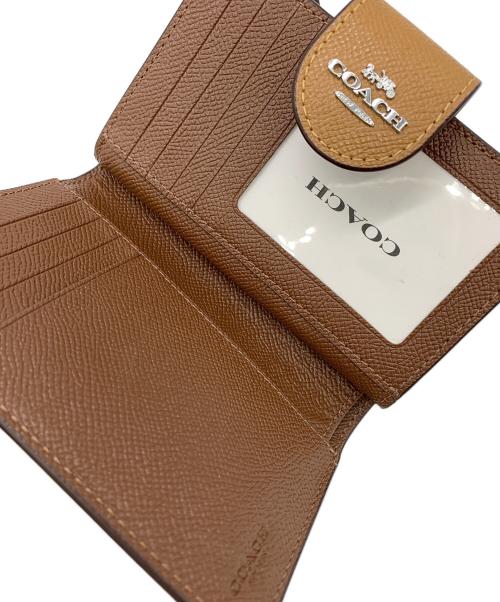 COACH（コーチ）COACH (コーチ) 2つ折り財布 ブラウンの古着・服飾アイテム
