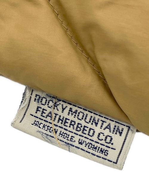 RockyMountainFeatherBed（ロッキーマウンテンフェザーベッド）RockyMountainFeatherBed (ロッキーマウンテンフェザーベッド) ダウンコート ブラウン サイズ:7/8の古着・服飾アイテム