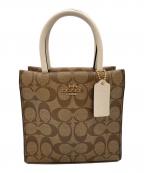 COACHコーチ）の古着「ミニ キャリー クロスボディ シグネチャー キャンバス」｜ブラウン