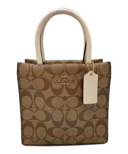 COACH（コーチ）COACH (コーチ) ミニ キャリー クロスボディ シグネチャー キャンバス ブラウンの古着・服飾アイテム