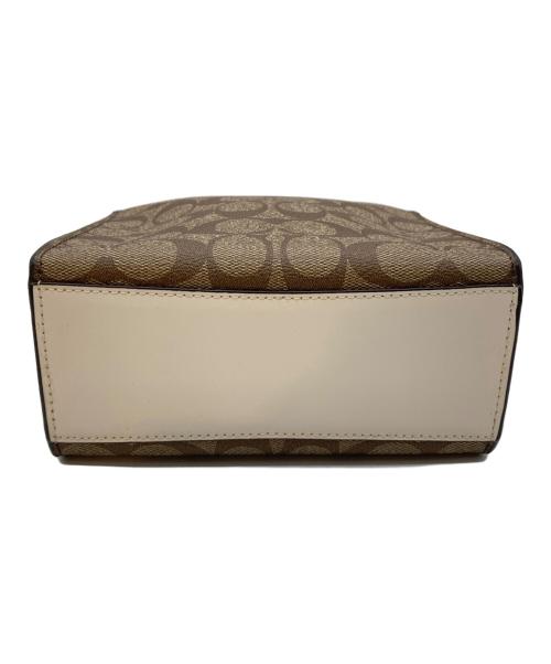 COACH（コーチ）COACH (コーチ) ミニ キャリー クロスボディ シグネチャー キャンバス ブラウンの古着・服飾アイテム