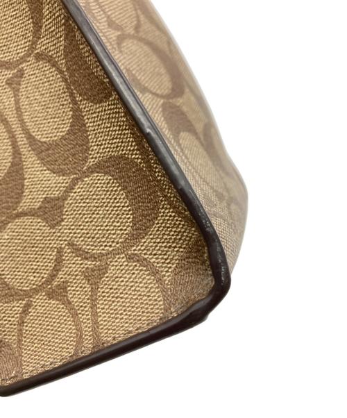 COACH（コーチ）COACH (コーチ) ミニ キャリー クロスボディ シグネチャー キャンバス ブラウンの古着・服飾アイテム