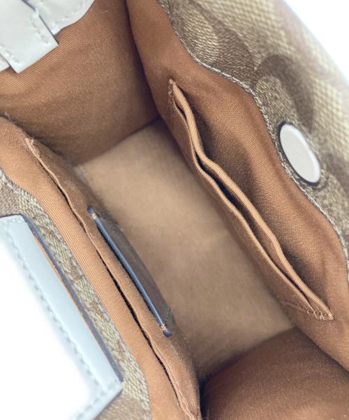 COACH（コーチ）COACH (コーチ) ミニ キャリー クロスボディ シグネチャー キャンバス ブラウンの古着・服飾アイテム