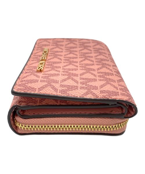 MICHAEL KORS（マイケル・コース）MICHAEL KORS (マイケル・コース) 3つ折り財布 ピンクの古着・服飾アイテム