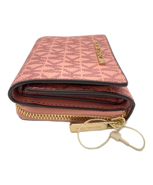 MICHAEL KORS（マイケル・コース）MICHAEL KORS (マイケル・コース) 3つ折り財布 ピンクの古着・服飾アイテム