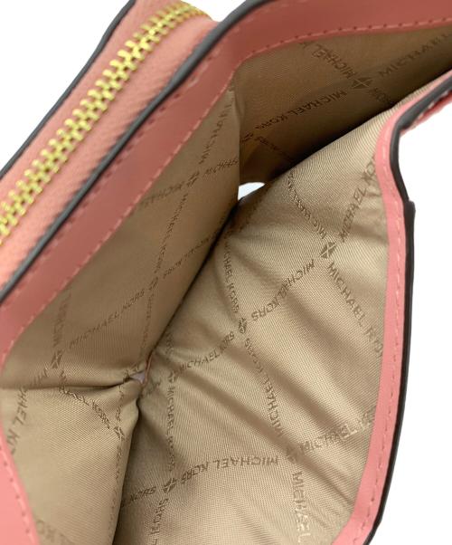 MICHAEL KORS（マイケル・コース）MICHAEL KORS (マイケル・コース) 3つ折り財布 ピンクの古着・服飾アイテム