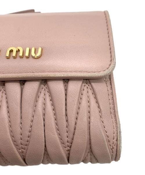 MIU MIU（ミュウミュウ）MIU MIU (ミュウミュウ) 3つ折り財布 ピンクの古着・服飾アイテム