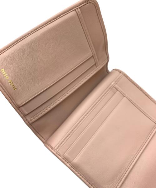 MIU MIU（ミュウミュウ）MIU MIU (ミュウミュウ) 3つ折り財布 ピンクの古着・服飾アイテム