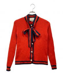 GUCCI（グッチ）の古着「シェリーリボンパールボタンカーディガン」｜オレンジ
