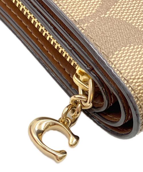 COACH（コーチ）COACH (コーチ) 2つ折り財布 ベージュの古着・服飾アイテム