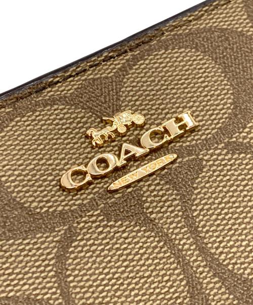 COACH（コーチ）COACH (コーチ) 2つ折り財布 ベージュの古着・服飾アイテム