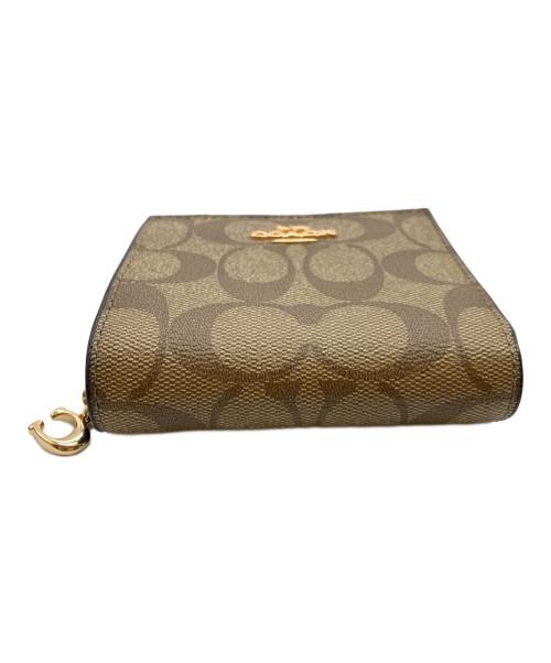COACH（コーチ）COACH (コーチ) 2つ折り財布 ベージュの古着・服飾アイテム