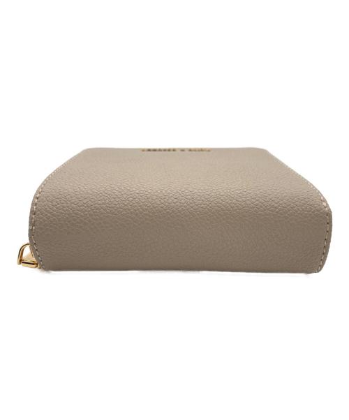 CHARLES & KEITH（チャールズアンドキース）CHARLES & KEITH (チャールズアンドキース) ジップアラウンドスモールウォレット ベージュの古着・服飾アイテム