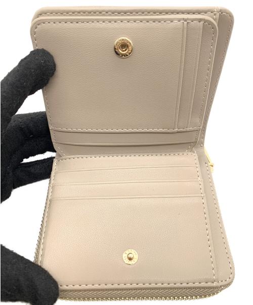 CHARLES & KEITH（チャールズアンドキース）CHARLES & KEITH (チャールズアンドキース) ジップアラウンドスモールウォレット ベージュの古着・服飾アイテム