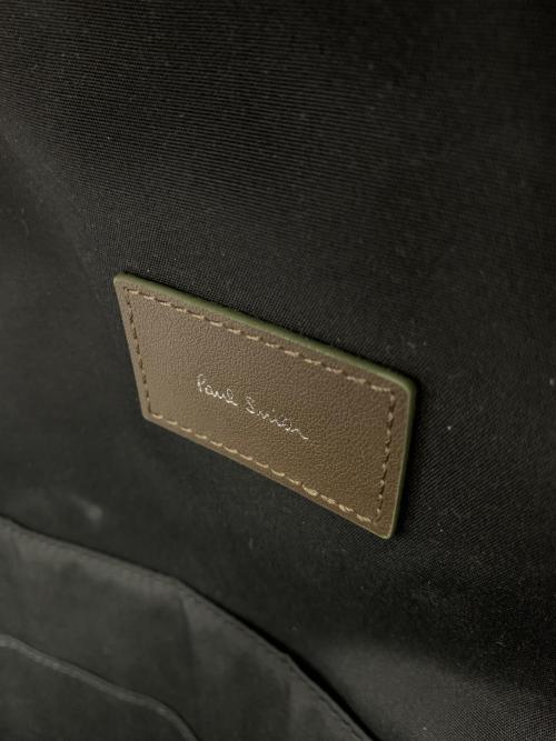 PAUL SMITH（ポールスミス）Paul Smith (ポールスミス) ロゴエンボス リュック ブラウン×イエローの古着・服飾アイテム