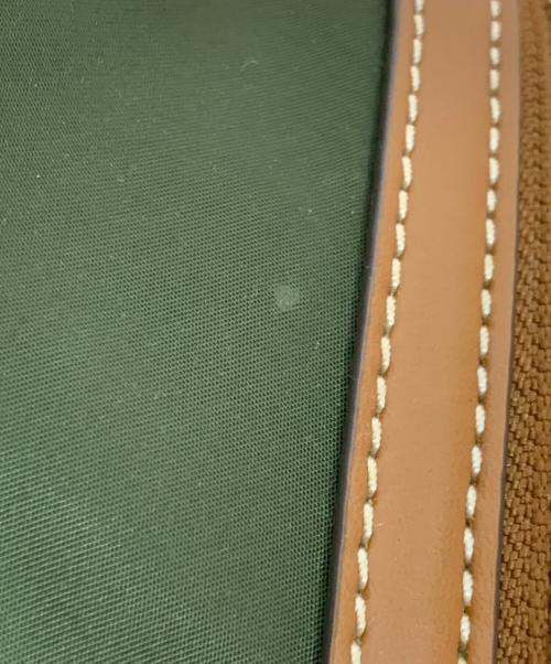 TORY BURCH（トリーバーチ）TORY BURCH (トリーバーチ) ムートンリュック カーキ×ベージュの古着・服飾アイテム