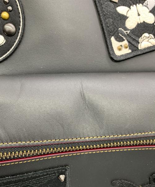 COACH（コーチ）COACH (コーチ) DISNEY (ディズニー) チャーリー ミッキー パッチワーク スタッズ ブラックの古着・服飾アイテム