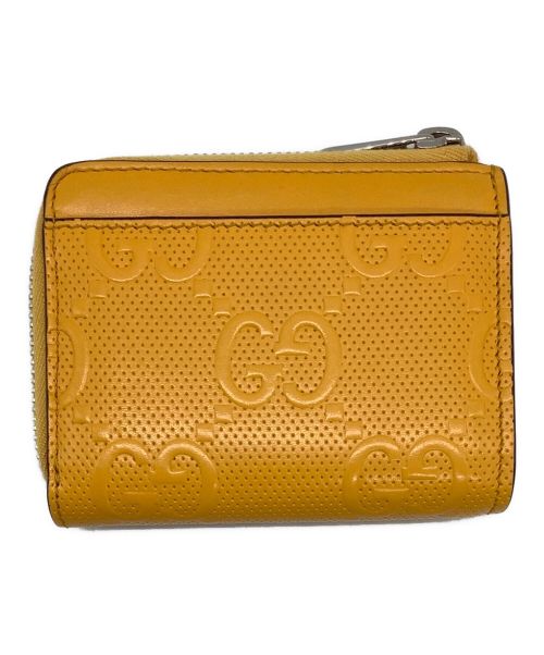 GUCCI（グッチ）GUCCI (グッチ) エンボスレザー グッチシマ コインケース イエローの古着・服飾アイテム