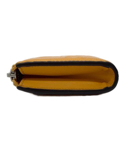 GUCCI（グッチ）GUCCI (グッチ) エンボスレザー グッチシマ コインケース イエローの古着・服飾アイテム