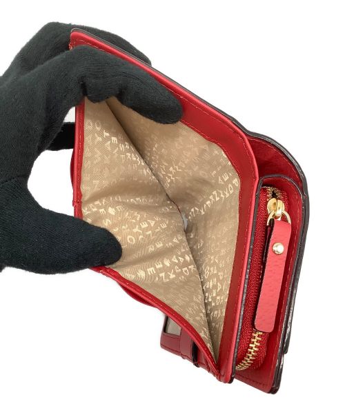 Kate Spade（ケイトスペード）Kate Spade (ケイトスペード) レザープレート 2つ折り財布 レッドの古着・服飾アイテム