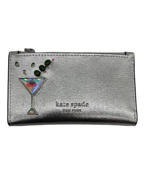 Kate Spade（ケイトスペード）Kate Spade (ケイトスペード) shaken not stirred embellished metallic small slim bifold wallet シルバーの古着・服飾アイテム