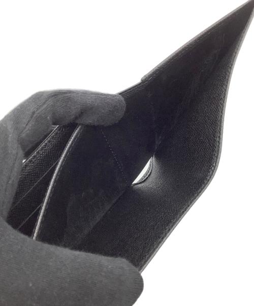 LOUIS VUITTON（ルイ ヴィトン）LOUIS VUITTON (ルイ ヴィトン) タイガ 2つ折り財布 ブラックの古着・服飾アイテム