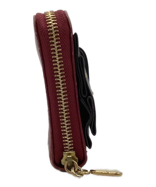 Chloe（クロエ）Chloe (クロエ) ラウンドファスナー財布 レッド×ブラウンの古着・服飾アイテム