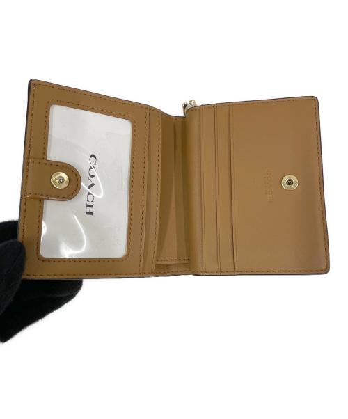 COACH（コーチ）COACH (コーチ) 2つ折り財布 ホワイトの古着・服飾アイテム