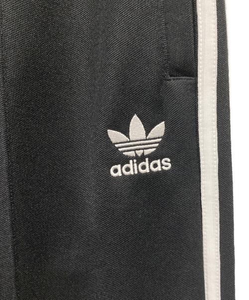 adidas（アディダス）adidas (アディダス) アディカラー バギーフィット ファイヤーバードトラックパンツ ブラック サイズ:Mの古着・服飾アイテム