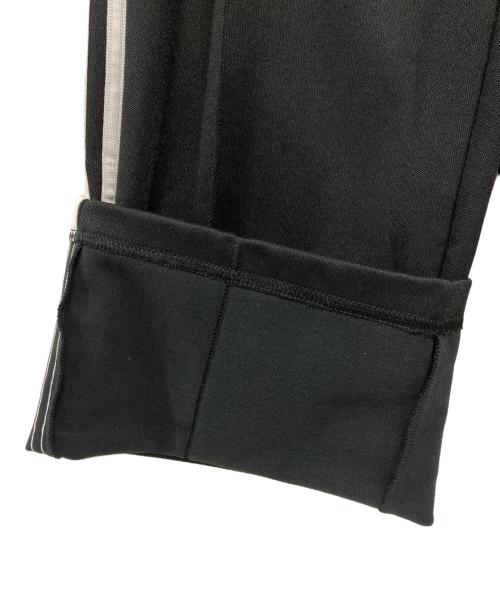 adidas（アディダス）adidas (アディダス) アディカラー バギーフィット ファイヤーバードトラックパンツ ブラック サイズ:Mの古着・服飾アイテム