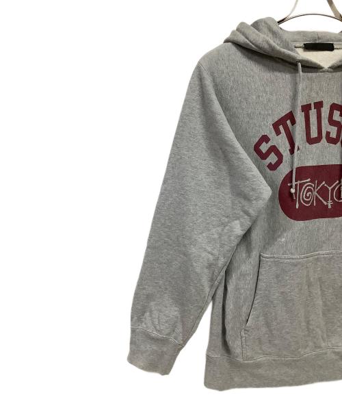 stussy（ステューシー）stussy (ステューシー) プルオーバーパーカー ライトグレー サイズ:Mの古着・服飾アイテム