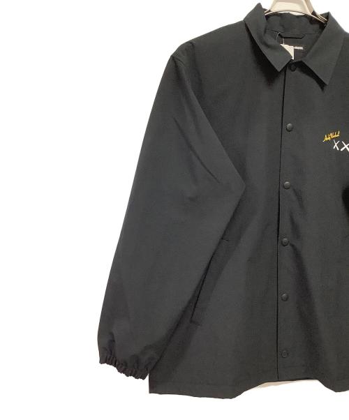 UNIQLO（ユニクロ）UNIQLO (ユニクロ) KAWS (カウズ) コーチジャケット ブラック サイズ:XL 未使用品の古着・服飾アイテム