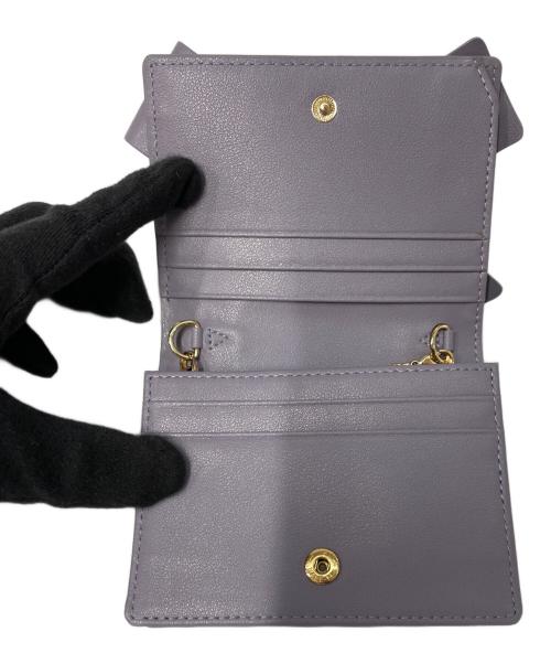 ostkaka（オストカーカ）ostkaka (オストカーカ) 2つ折り財布 ラベンダーの古着・服飾アイテム