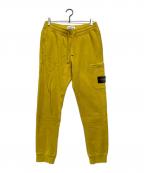 STONE ISLANDストーンアイランド）の古着「スウェットパンツ」｜イエロー