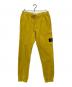 STONE ISLAND（ストーンアイランド）の古着「スウェットパンツ」｜イエロー