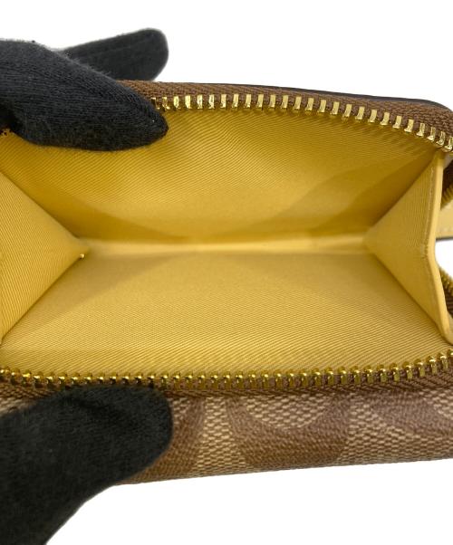 COACH（コーチ）COACH (コーチ) シグネチャー 3つ折り財布 ブラウンの古着・服飾アイテム