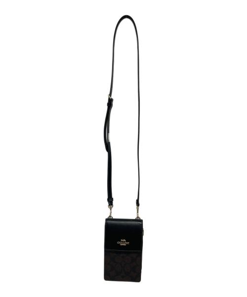 COACH（コーチ）COACH (コーチ) ノース／サウス フォーン クロスボディ・シグネチャー キャンバス ダークブラウン 未使用品の古着・服飾アイテム
