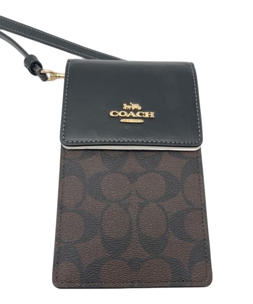 COACH（コーチ）COACH (コーチ) ノース／サウス フォーン クロスボディ・シグネチャー キャンバス ダークブラウン 未使用品の古着・服飾アイテム