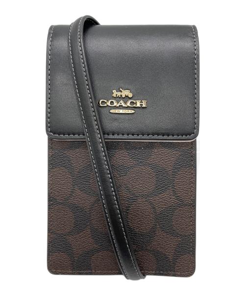 COACH（コーチ）COACH (コーチ) ノース／サウス フォーン クロスボディ・シグネチャー キャンバス ダークブラウン 未使用品の古着・服飾アイテム