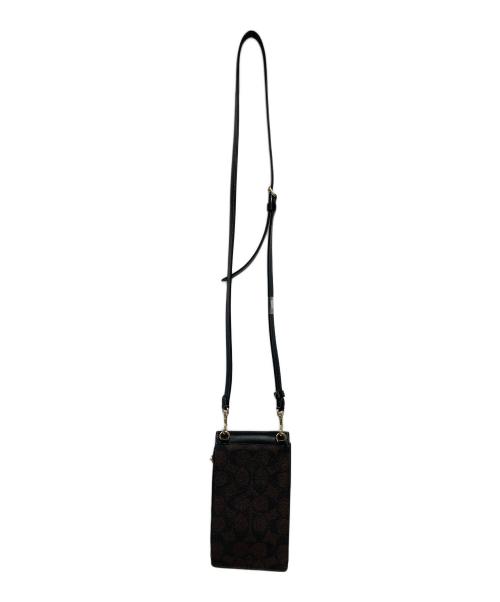 COACH（コーチ）COACH (コーチ) ノース／サウス フォーン クロスボディ・シグネチャー キャンバス ダークブラウン 未使用品の古着・服飾アイテム