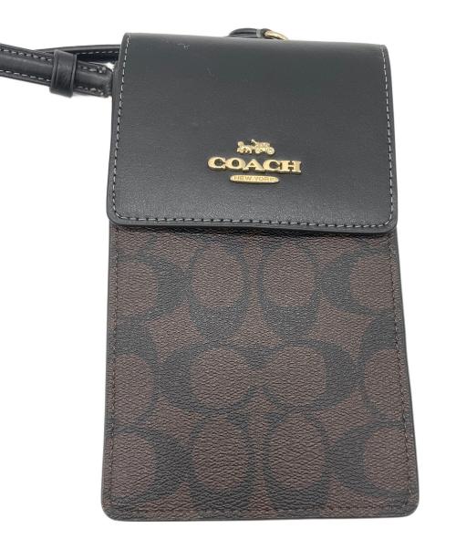 COACH（コーチ）COACH (コーチ) ノース／サウス フォーン クロスボディ・シグネチャー キャンバス ダークブラウン 未使用品の古着・服飾アイテム